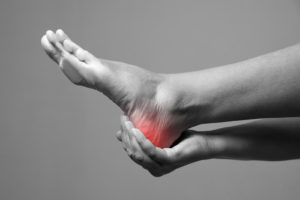 Patient cradling injured foot